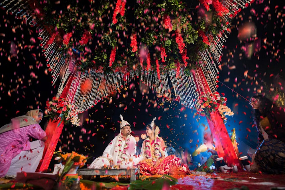 Creative wedding photography ideas during wedding ritual for Indian bride and groom | Memories Designer