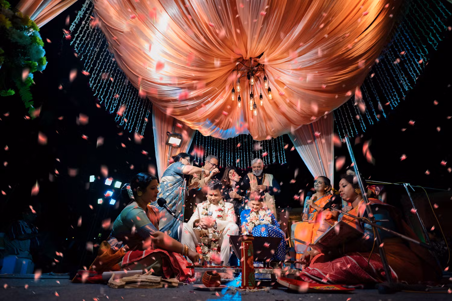 Best wedding photo ideas of Indian groom and bride under confetti shower