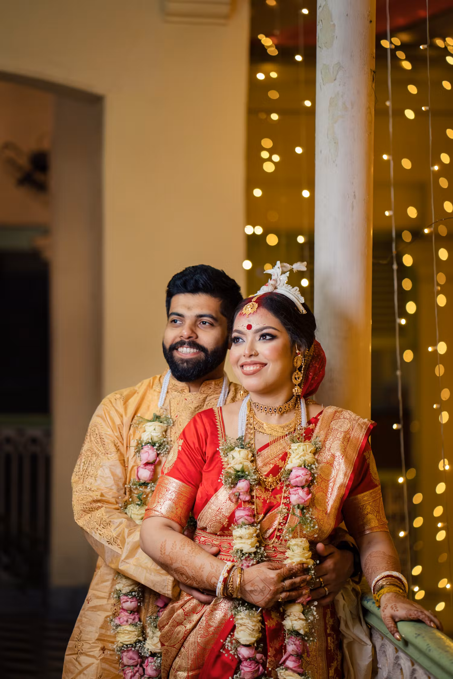 Best wedding photo ideas of Bengali couple staring away