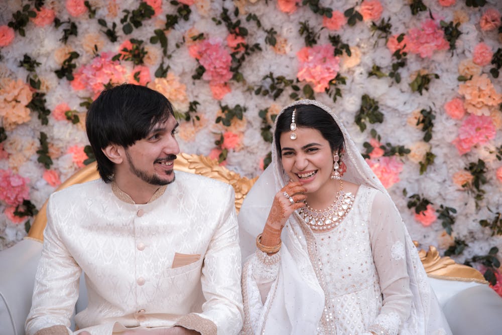 Candid wedding photo of Muslim couple