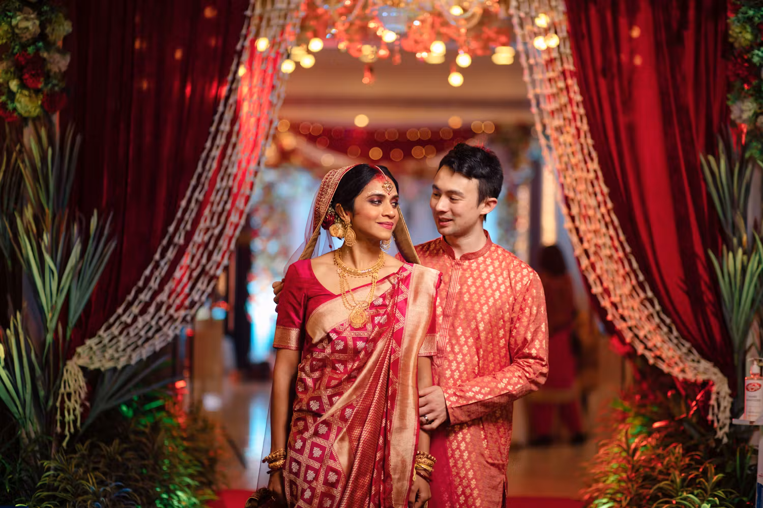 Sweet Bengali couple reception wedding day pose