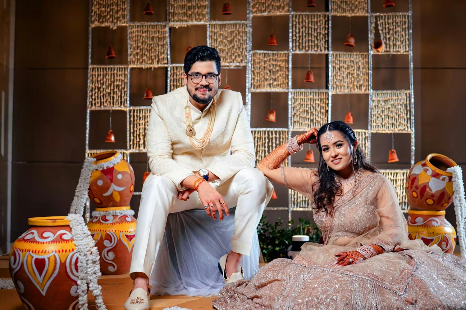 Groom white serwani look with bride pic