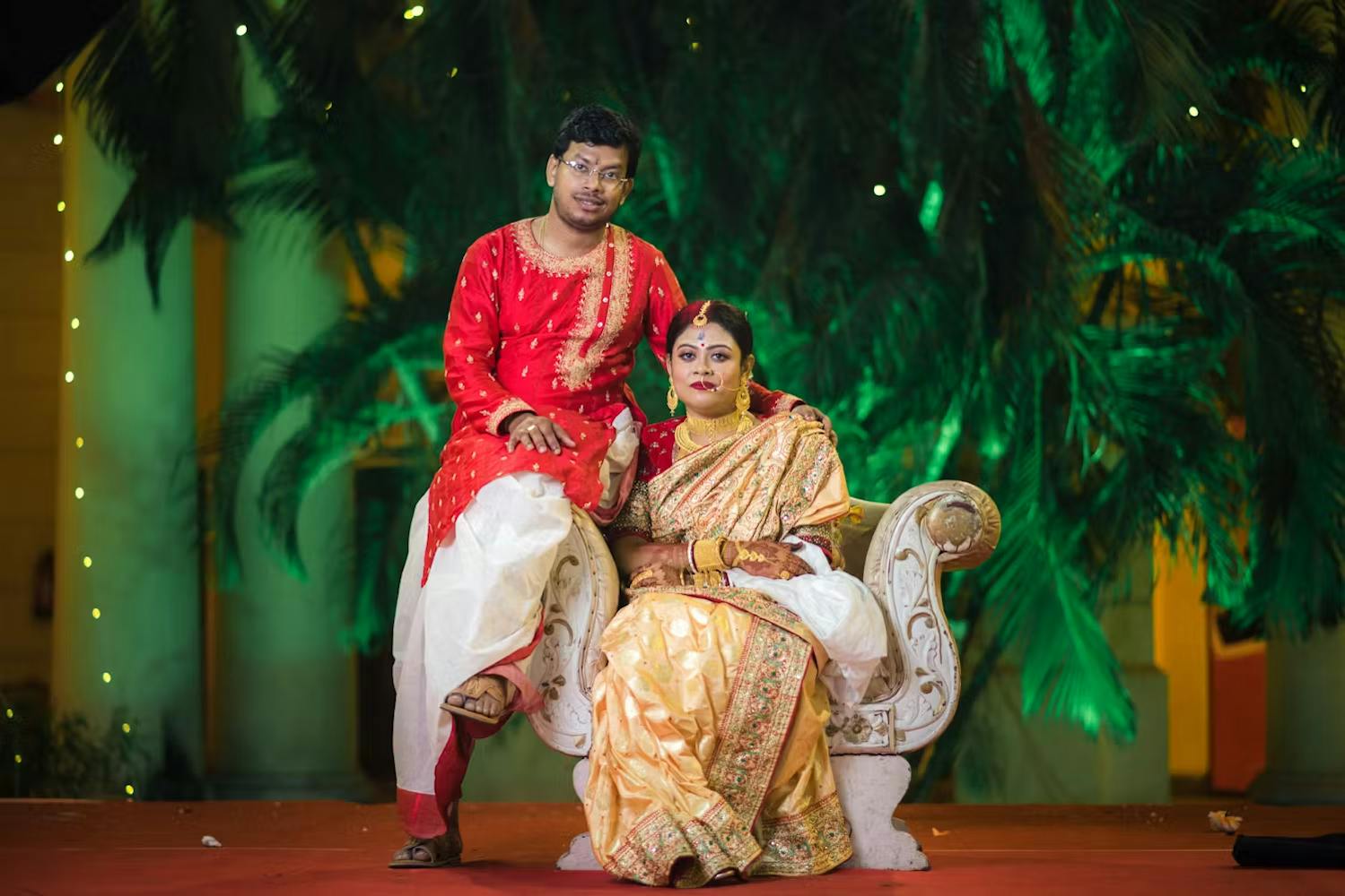 Groom wearing red punjabi with dhoti look