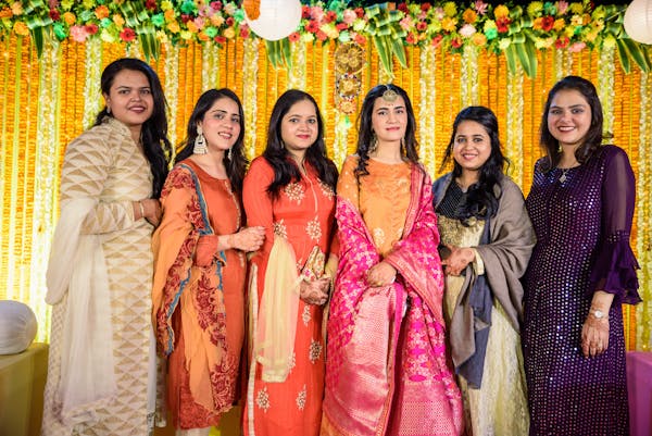 Standing pic of Muslim bride with friends