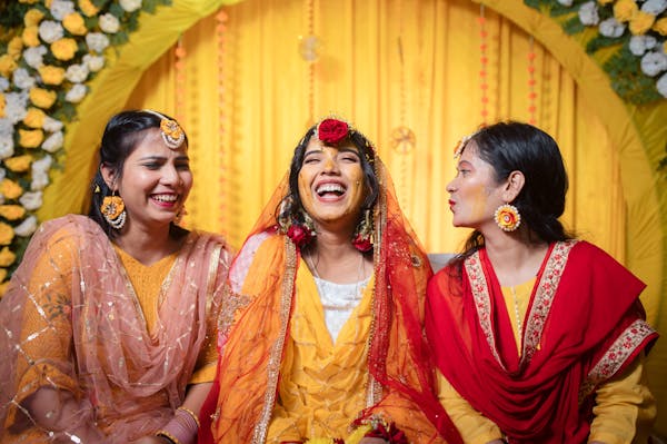 A candid image of bride with friends