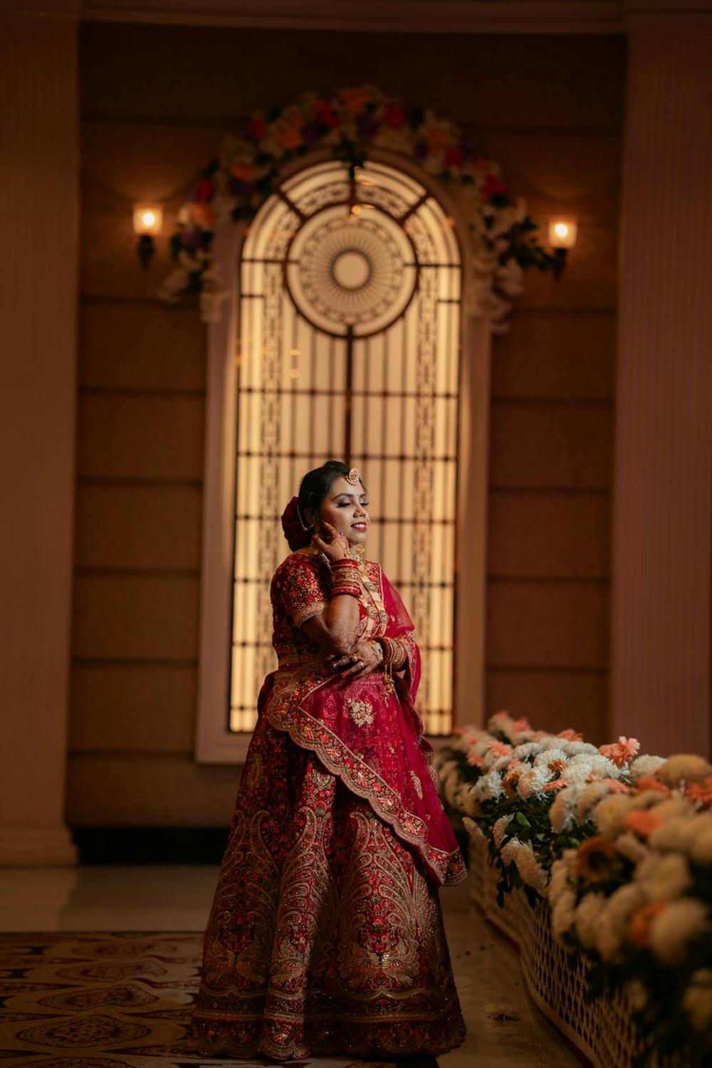 Playfully Show Your Bracelets With Hand on Cheek