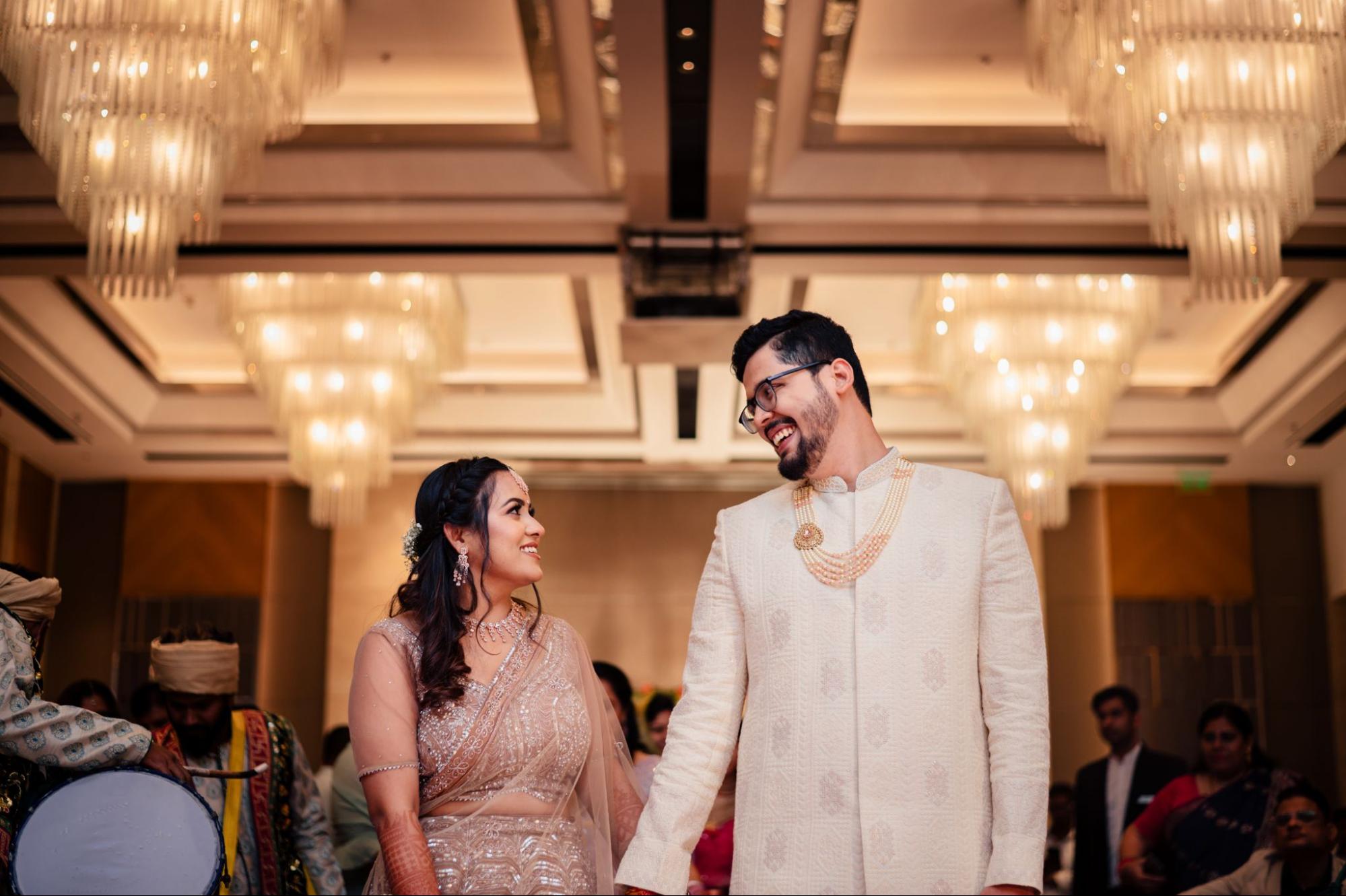 Intertwined Fingers: Romantic Entry With Held Hands