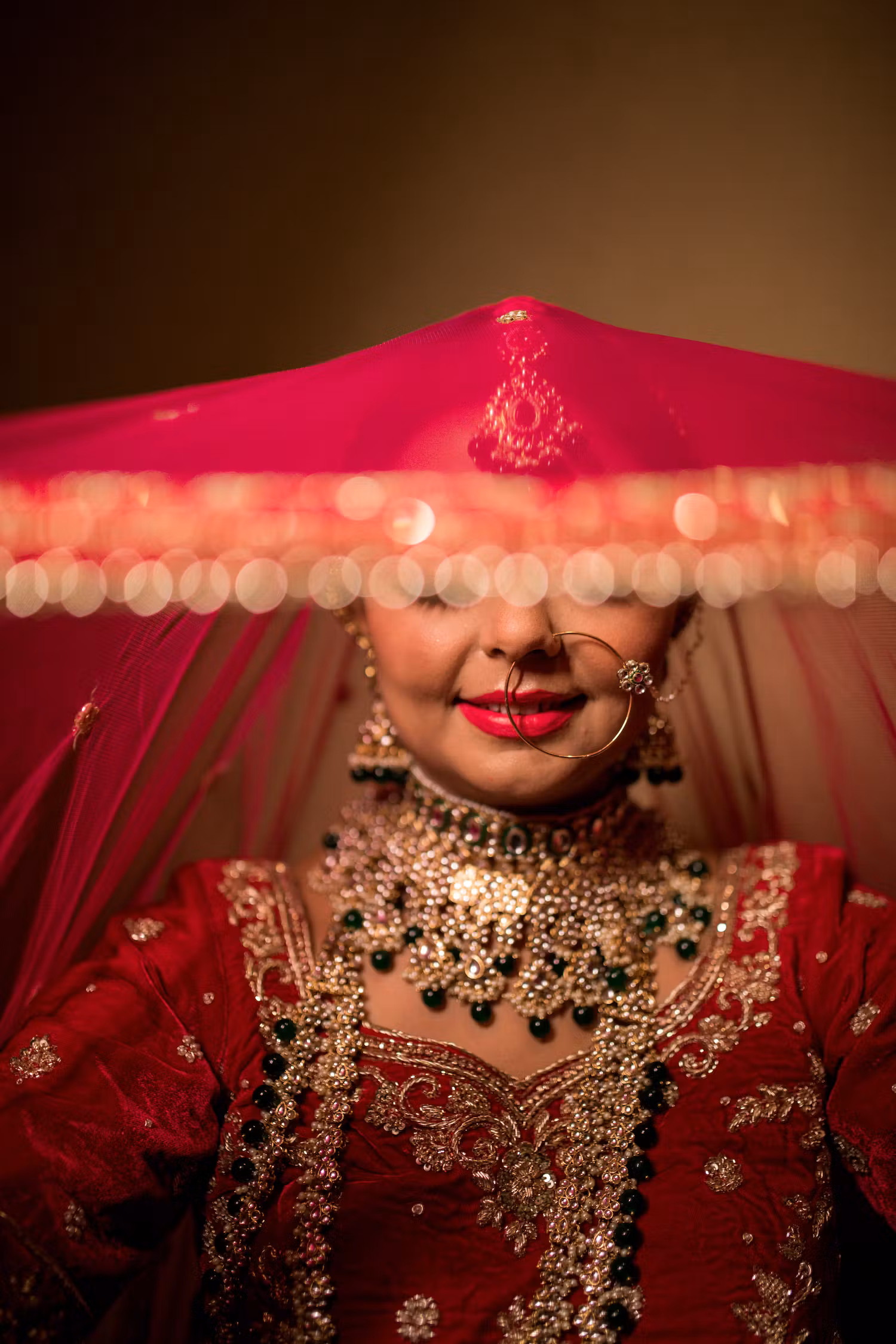 Bride unveiling her wedding veil photography pose