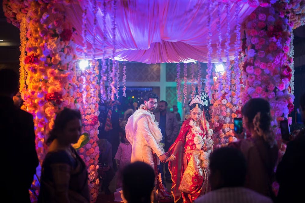Image of a couple taking wedding vows in their marriage day