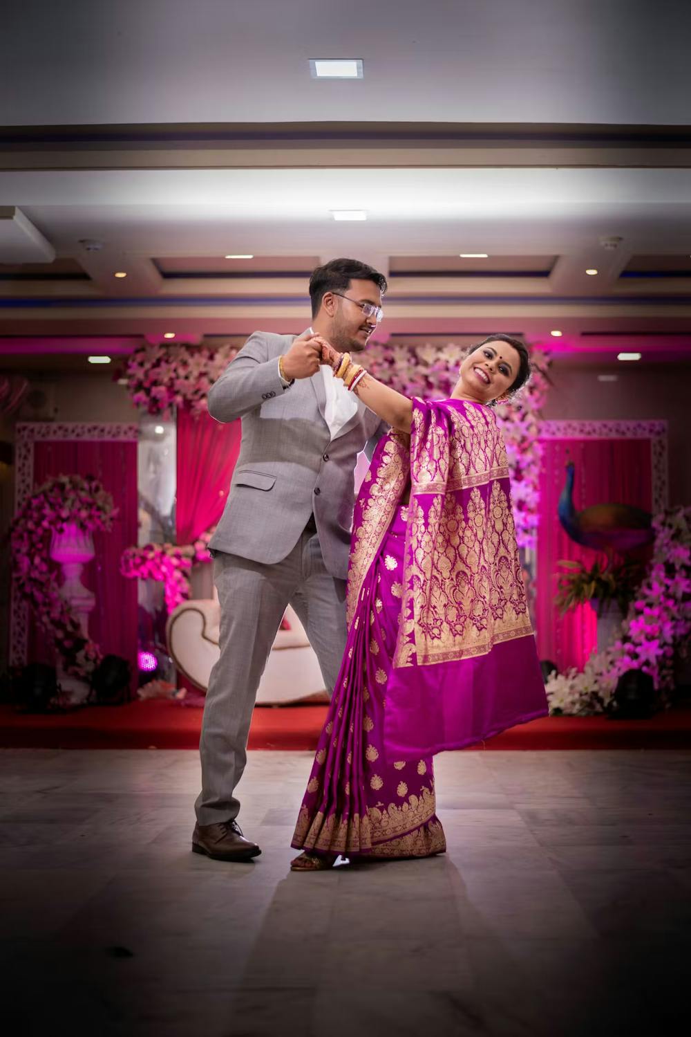 Couple enjoying a dance at their reception party pic