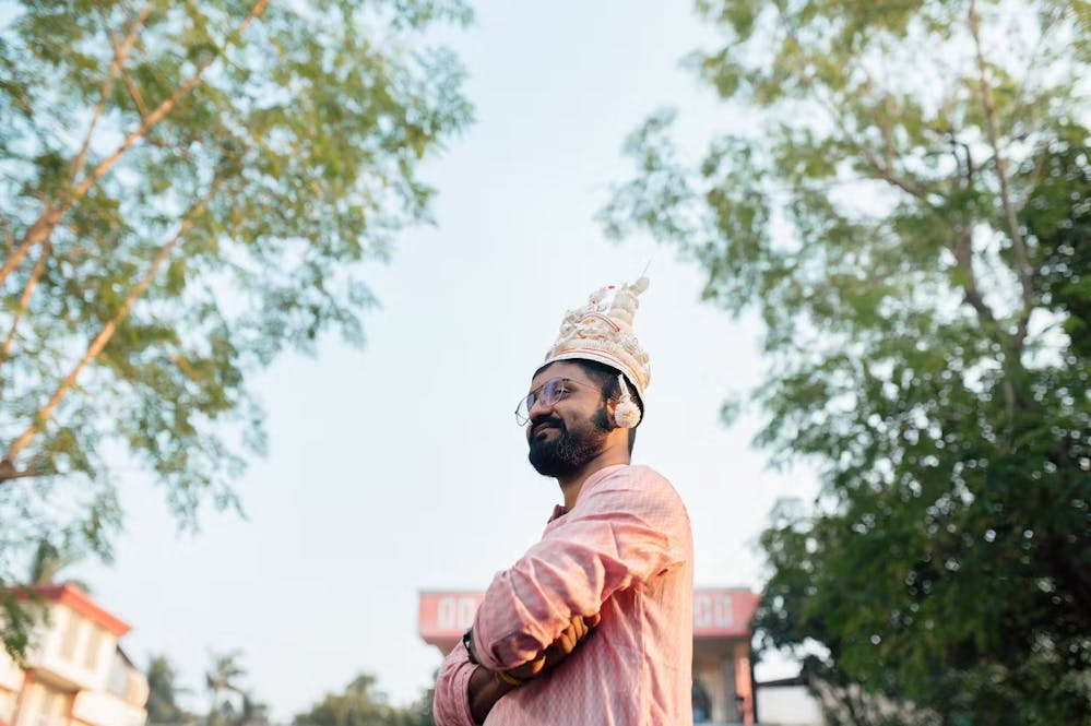 Groom posing in simple motif kurta pic