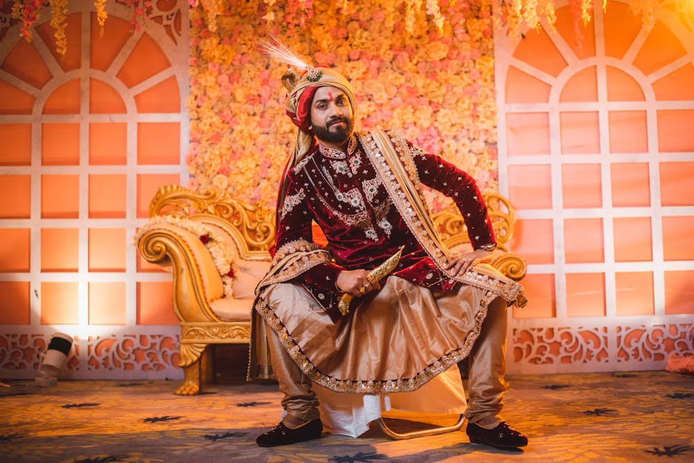 A regal posing photo of a handsome groom