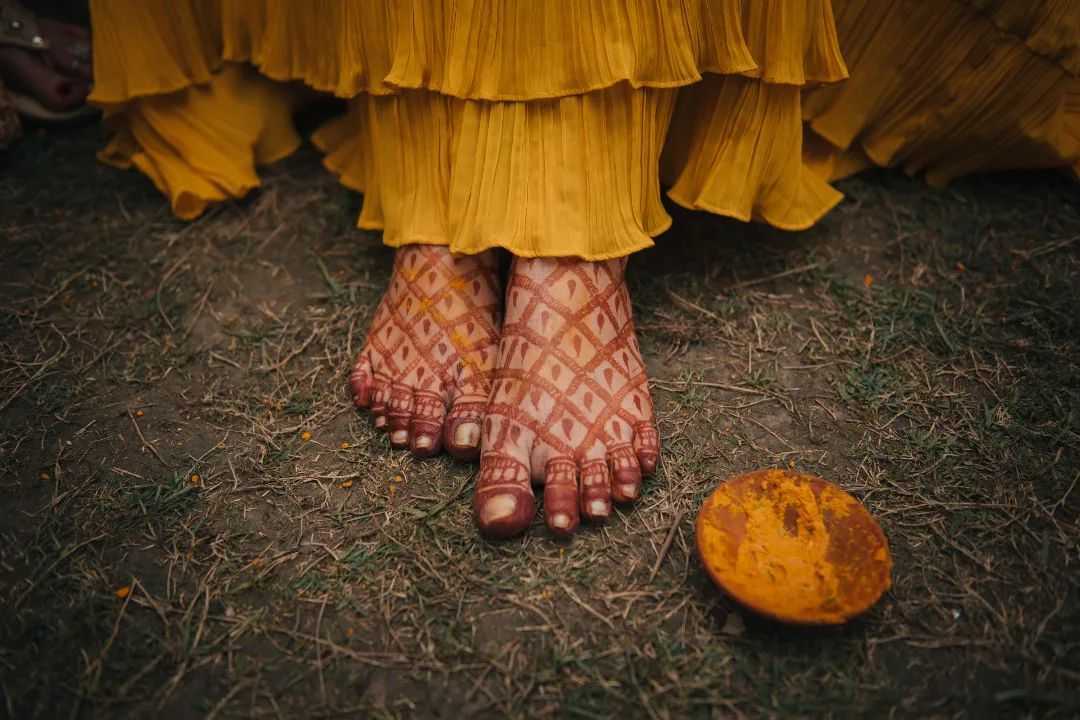 Brides feet for bridal Haldi poses pic