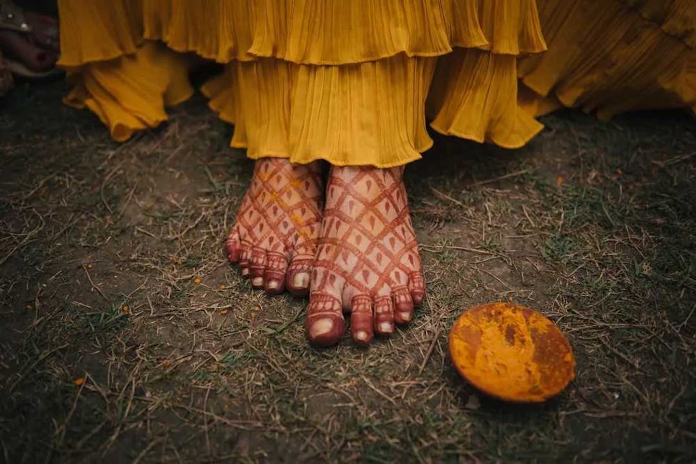 Brides feet for bridal Haldi poses pic