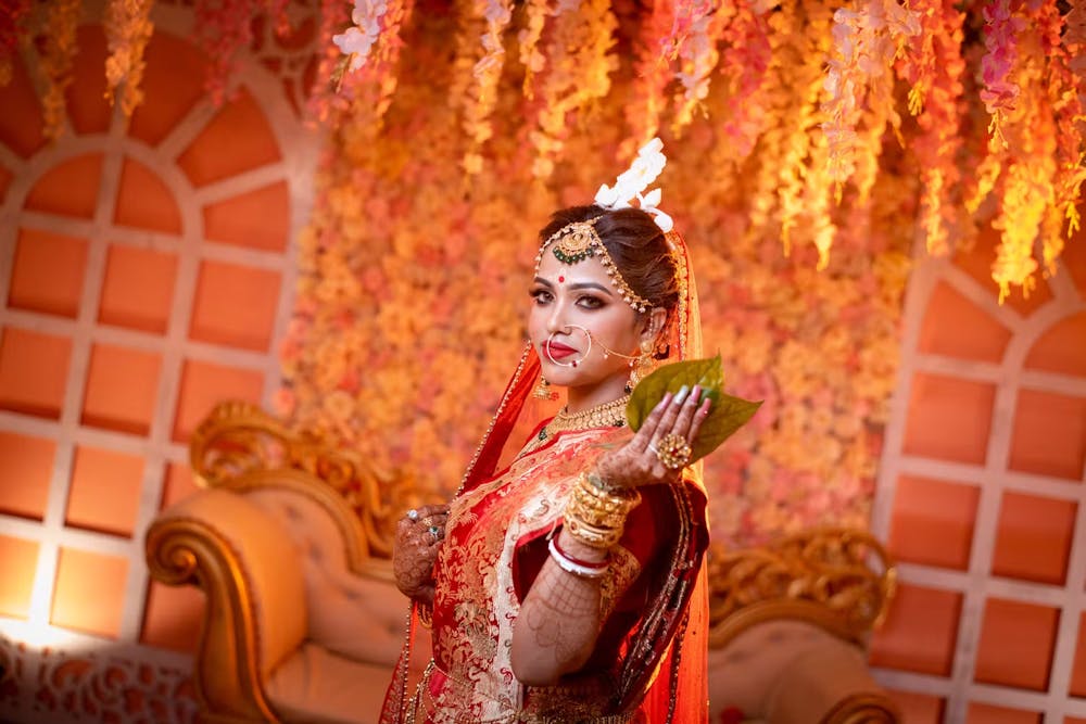 Bong beauty in red Banarasi saree image