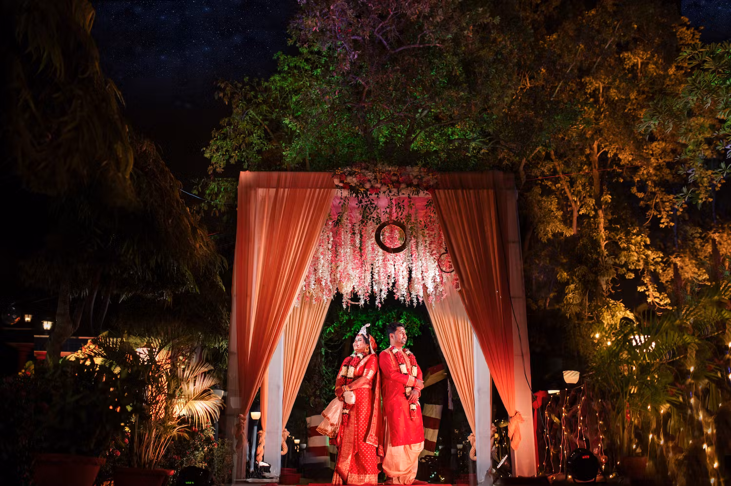 Picture of wedding couple standing backwards