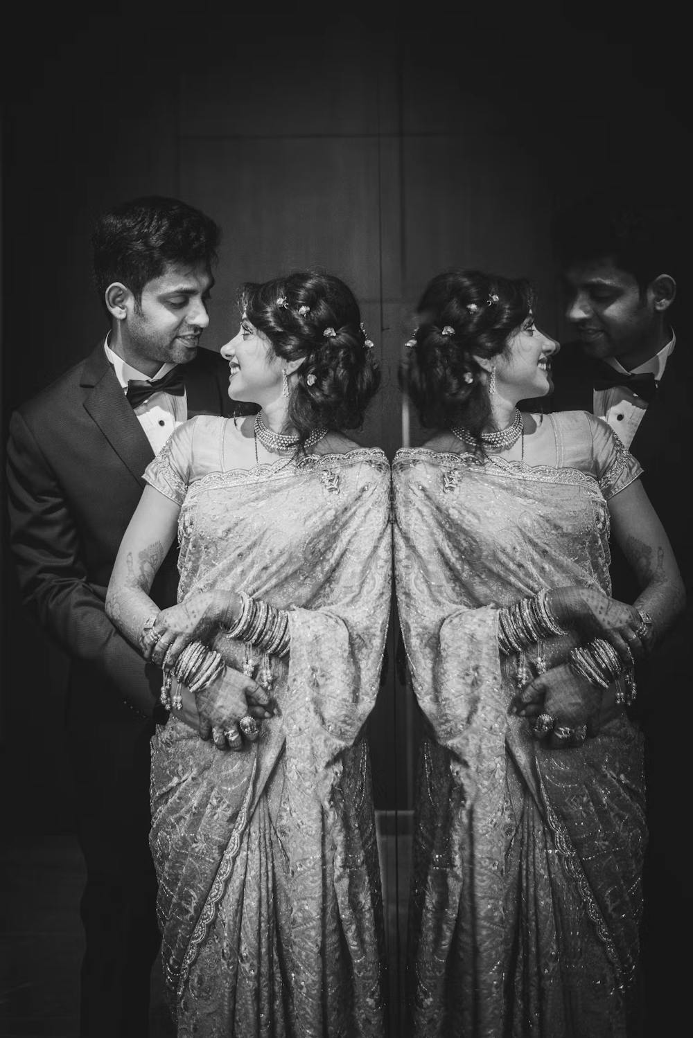 Perfect hair-do of bride in her reception party couple photo