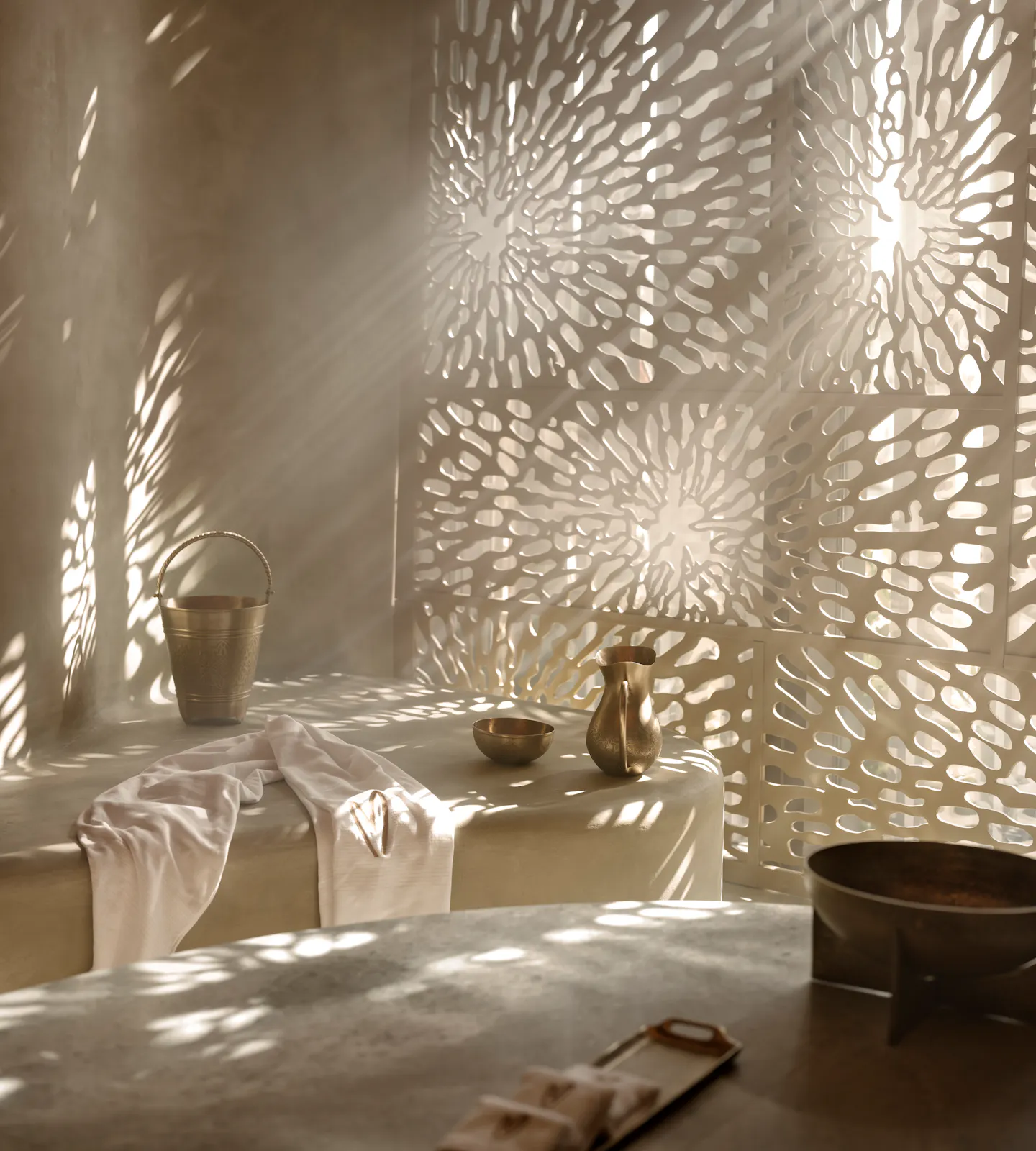 Hammam basin with traditional bathing tools at Meraki Wellness