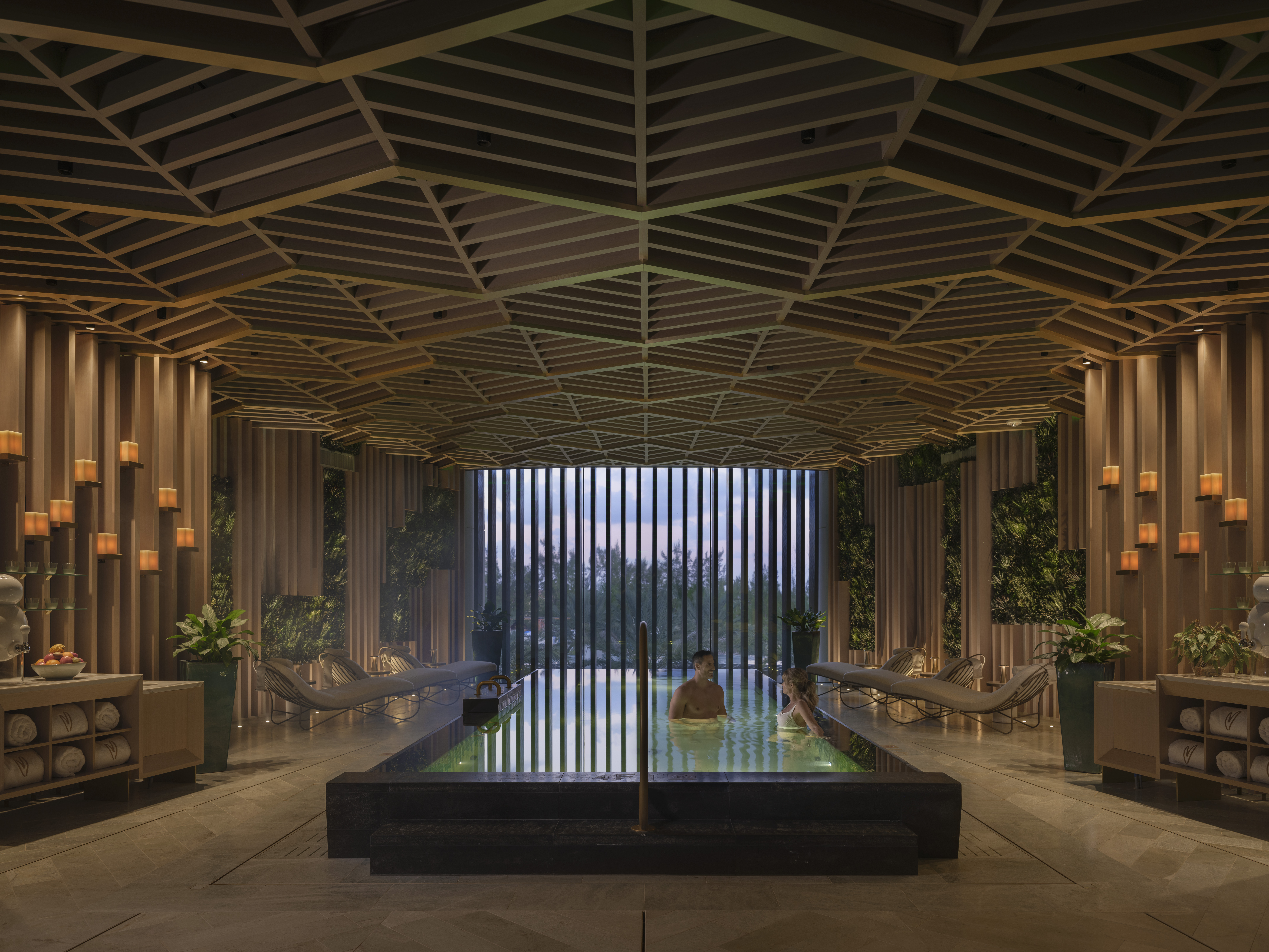 Guests enjoying the Mineral Pool in the evening at Meraki Wellness