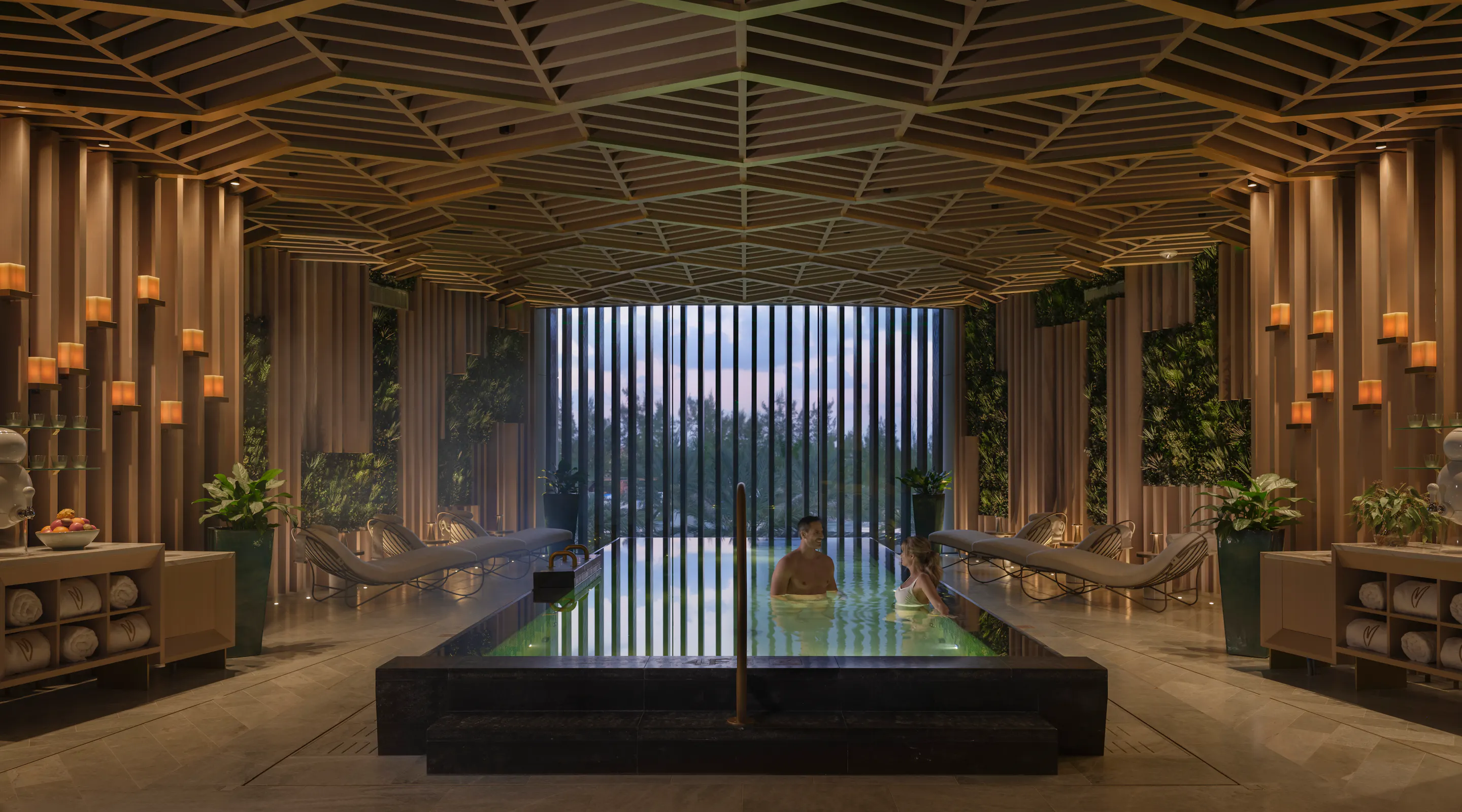 Guests enjoying the Mineral Pool in the evening at Meraki Wellness