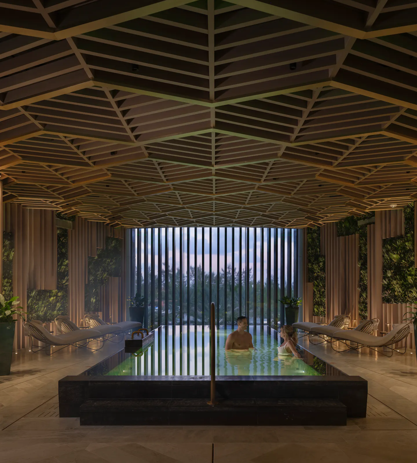 Guests enjoying the Mineral Pool in the evening at Meraki Wellness