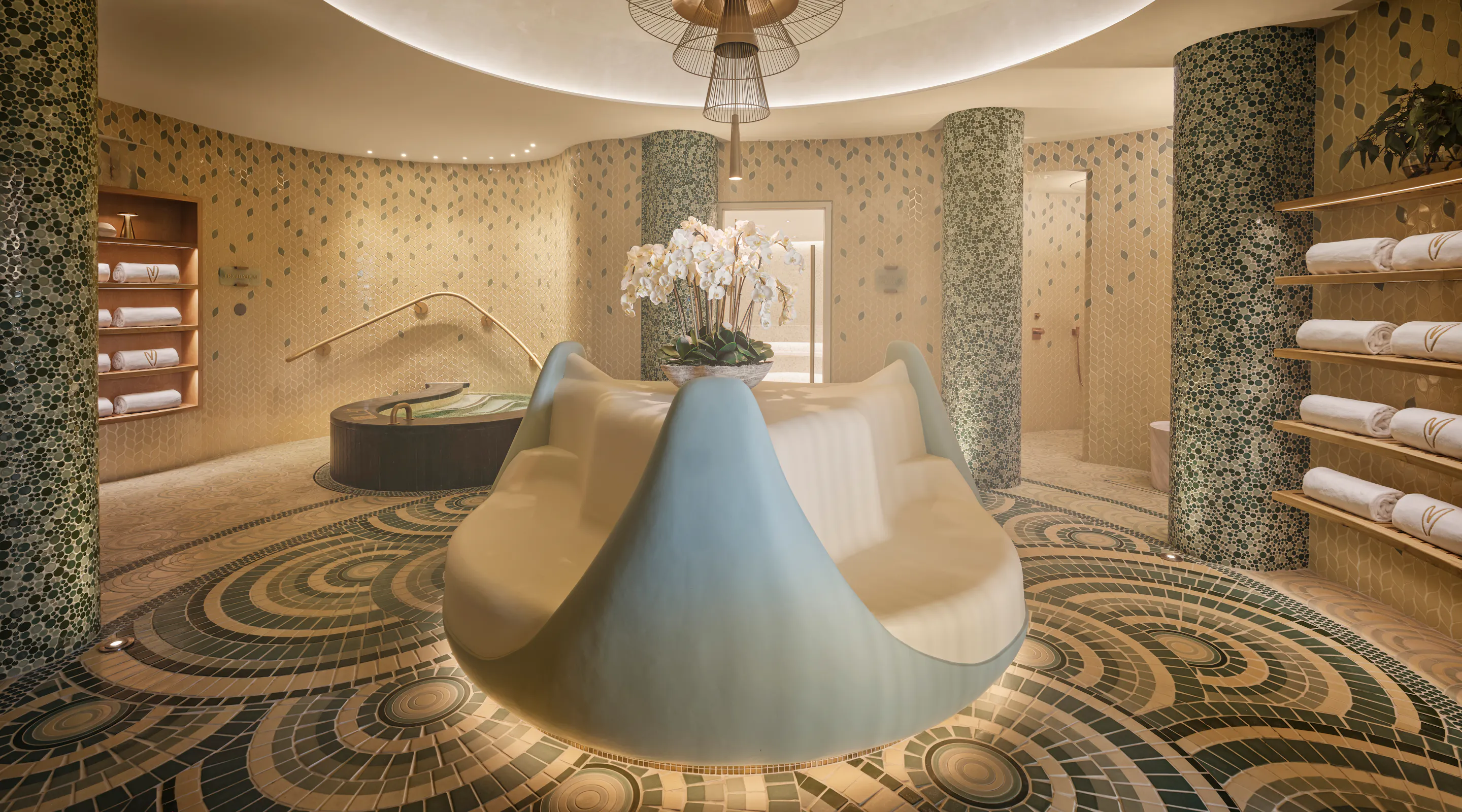 Tepidarium heated seating in the middle of the contrast therapy experience at Meraki Wellness