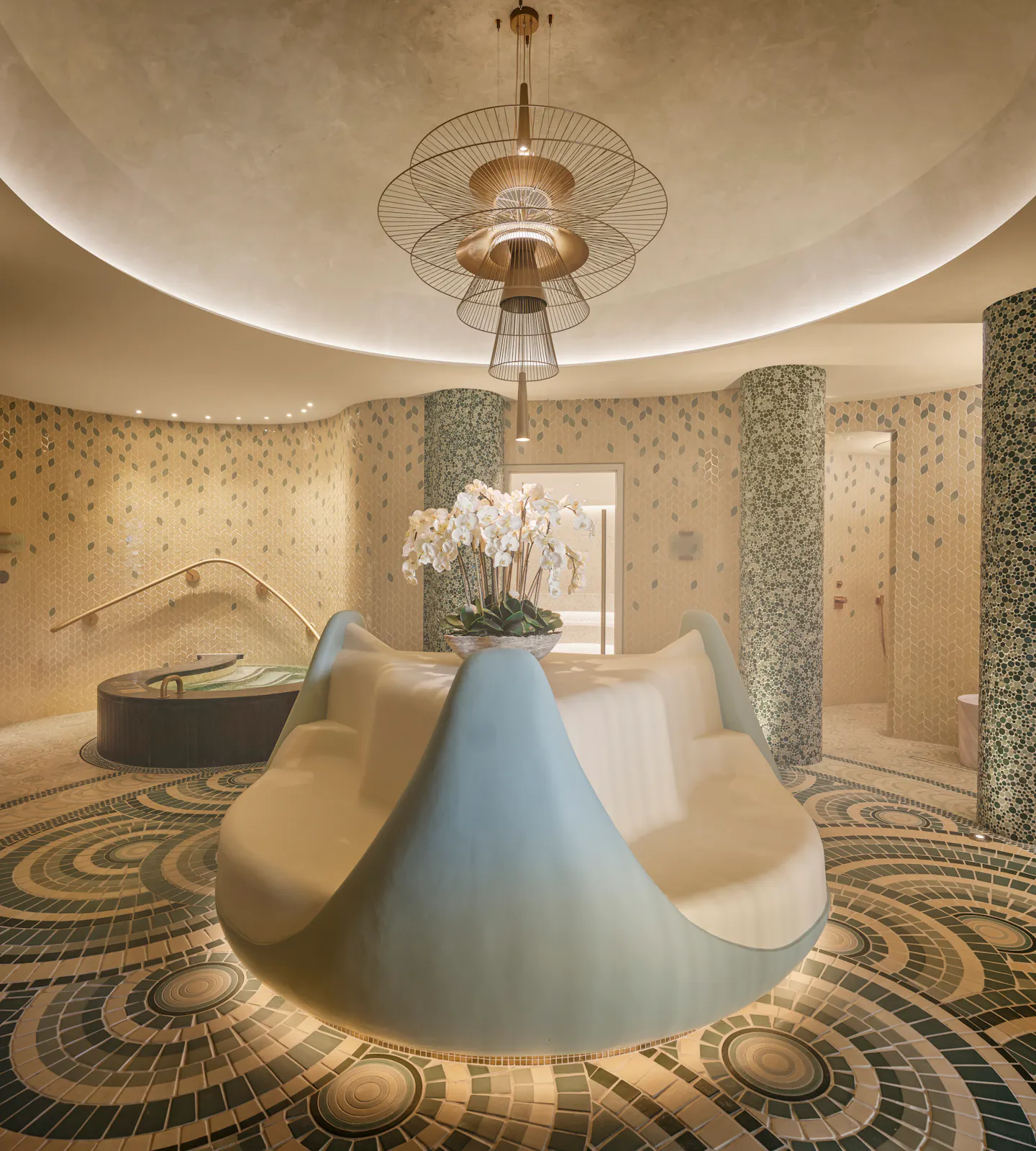 Tepidarium heated seating in the middle of the contrast therapy experience at Meraki Wellness