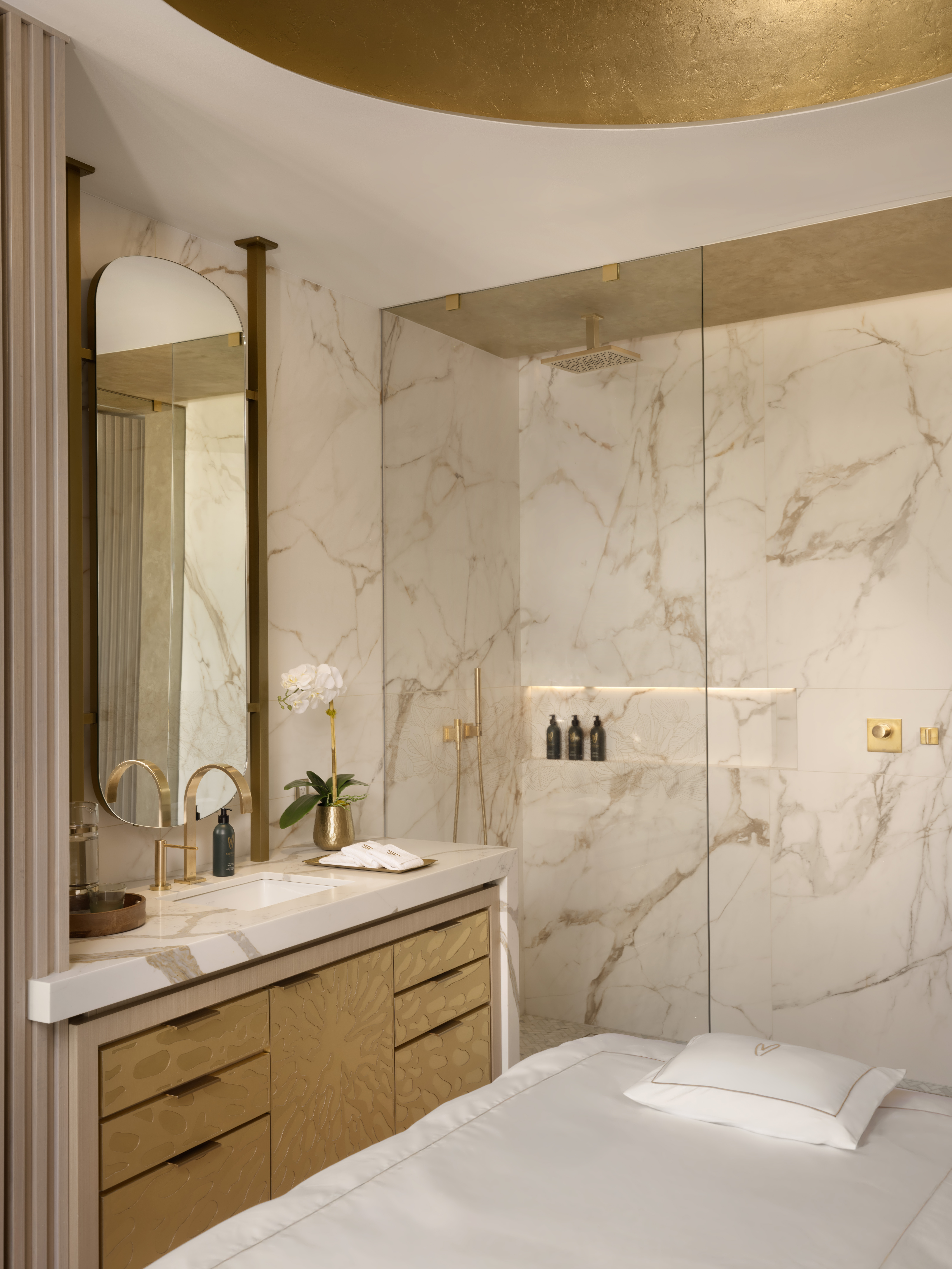 Luxury Treatment Suite with marble shower and vanity at Meraki Wellness in Grand Cayman