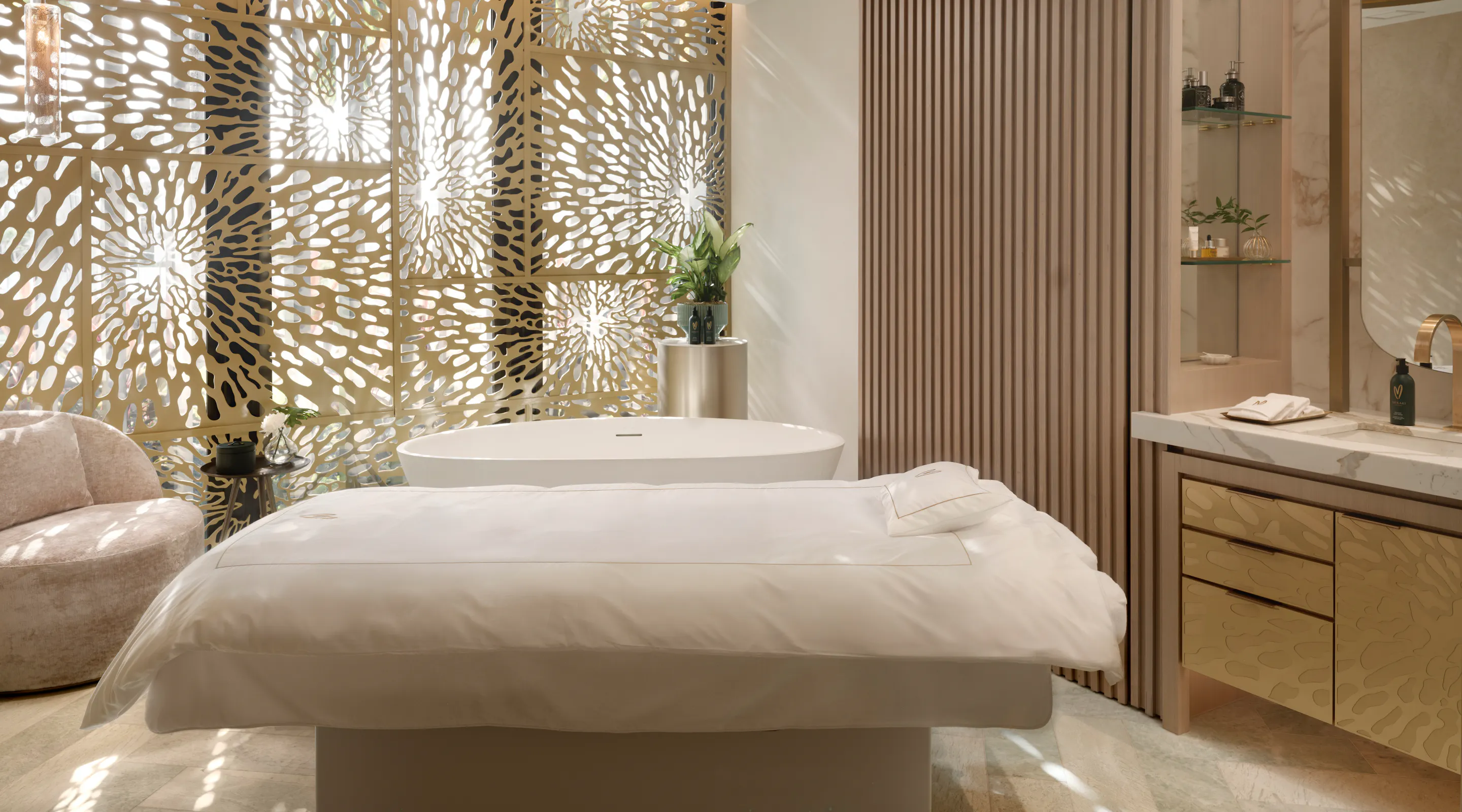 Luxury Signature Suite with bath and treatment bed for solo spa packages at Meraki Wellness