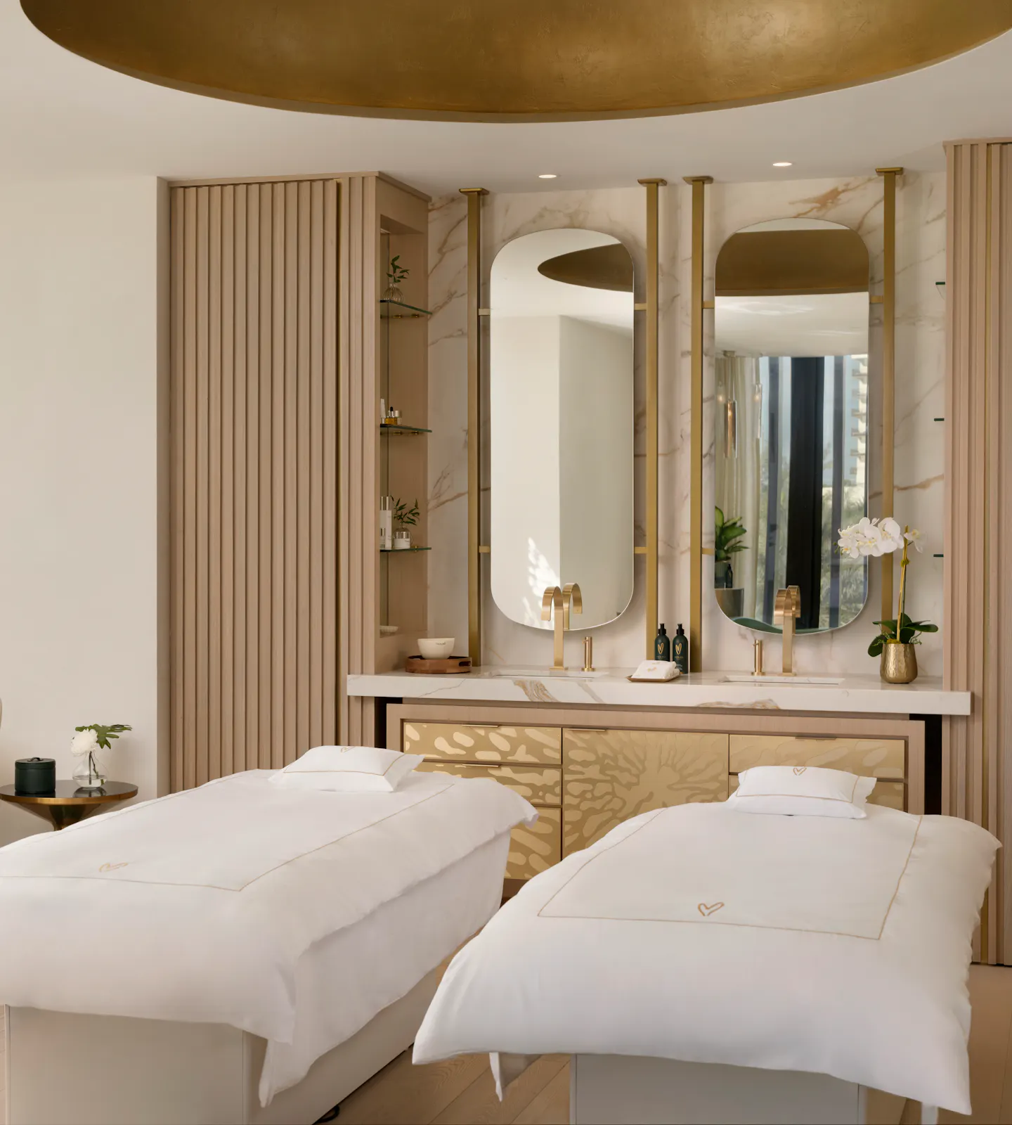 Two treatment beds in the Luxury Signature Suite for spa packages at Meraki Wellness in the Cayman Islands