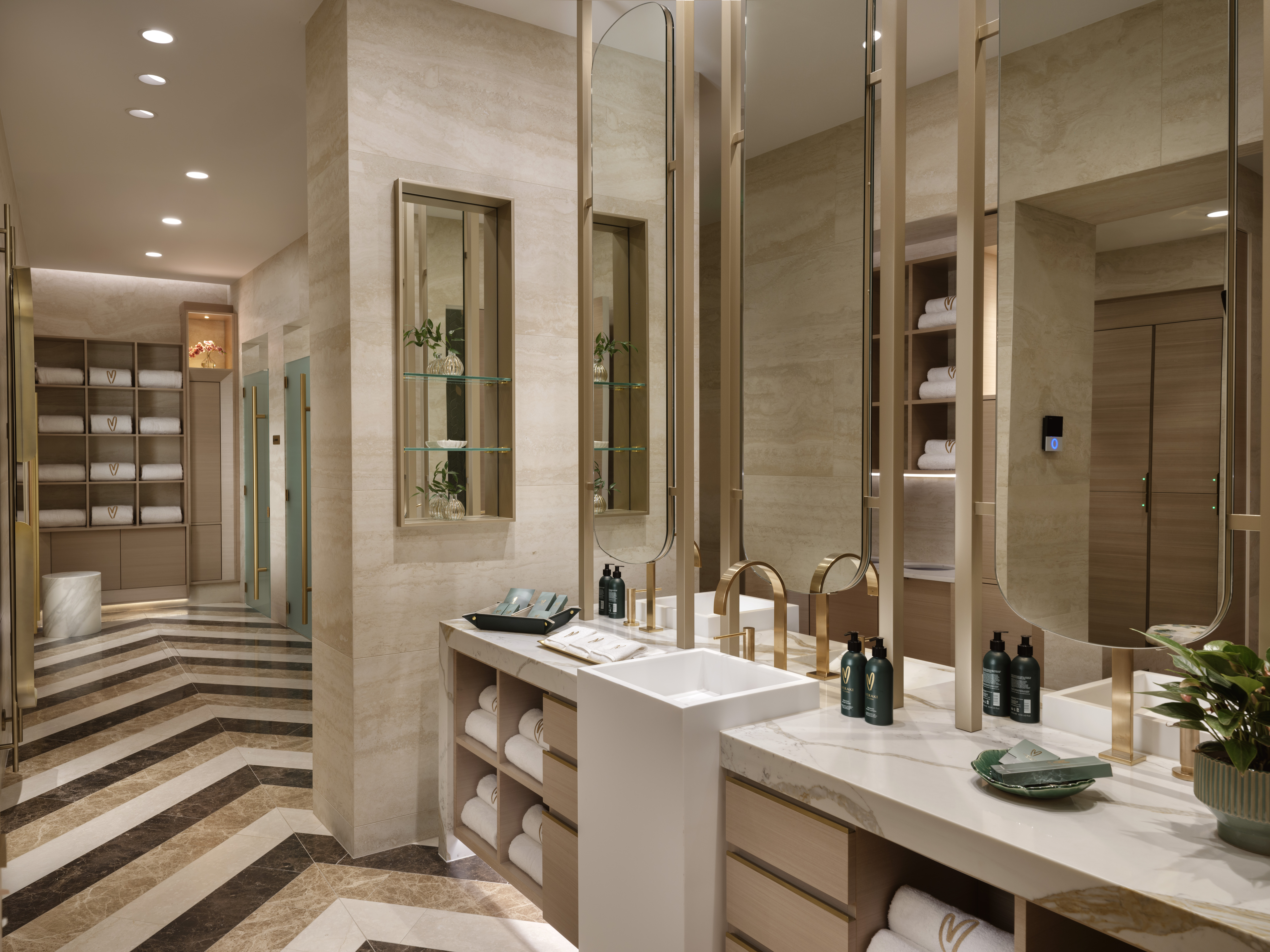 Luxury Changing Room with marble vanities and mirrors at Meraki Wellness