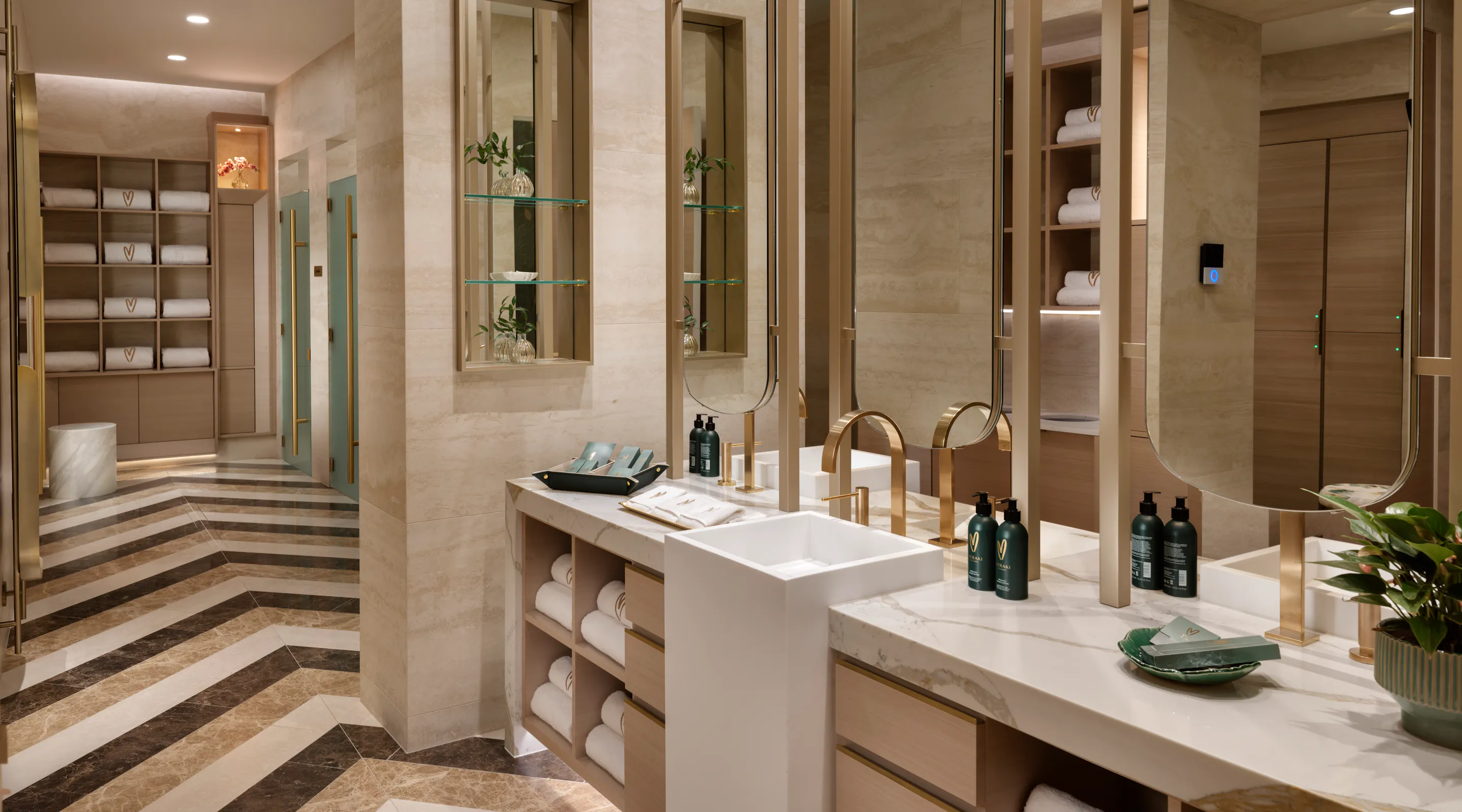 Luxury Changing Room with marble vanities and mirrors at Meraki Wellness