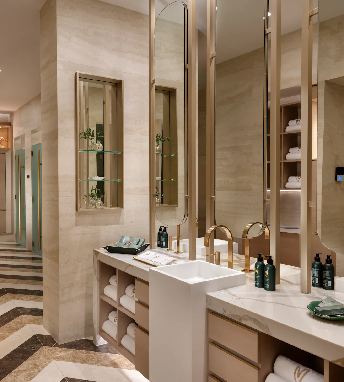 Luxury Changing Room with marble vanities and mirrors at Meraki Wellness
