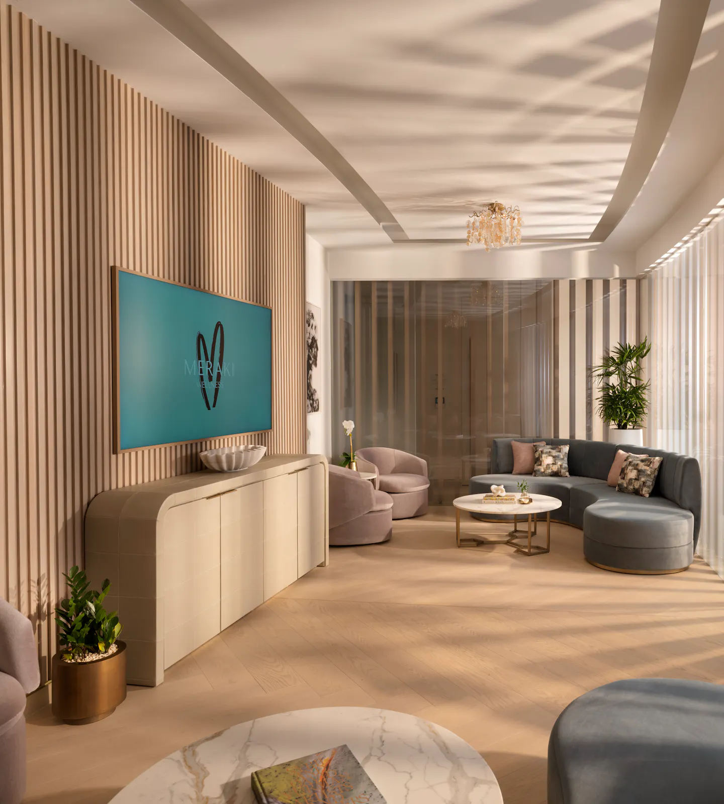 Meraki Wellness Grand Cayman Event Lounge with curved sofas and a TV screen