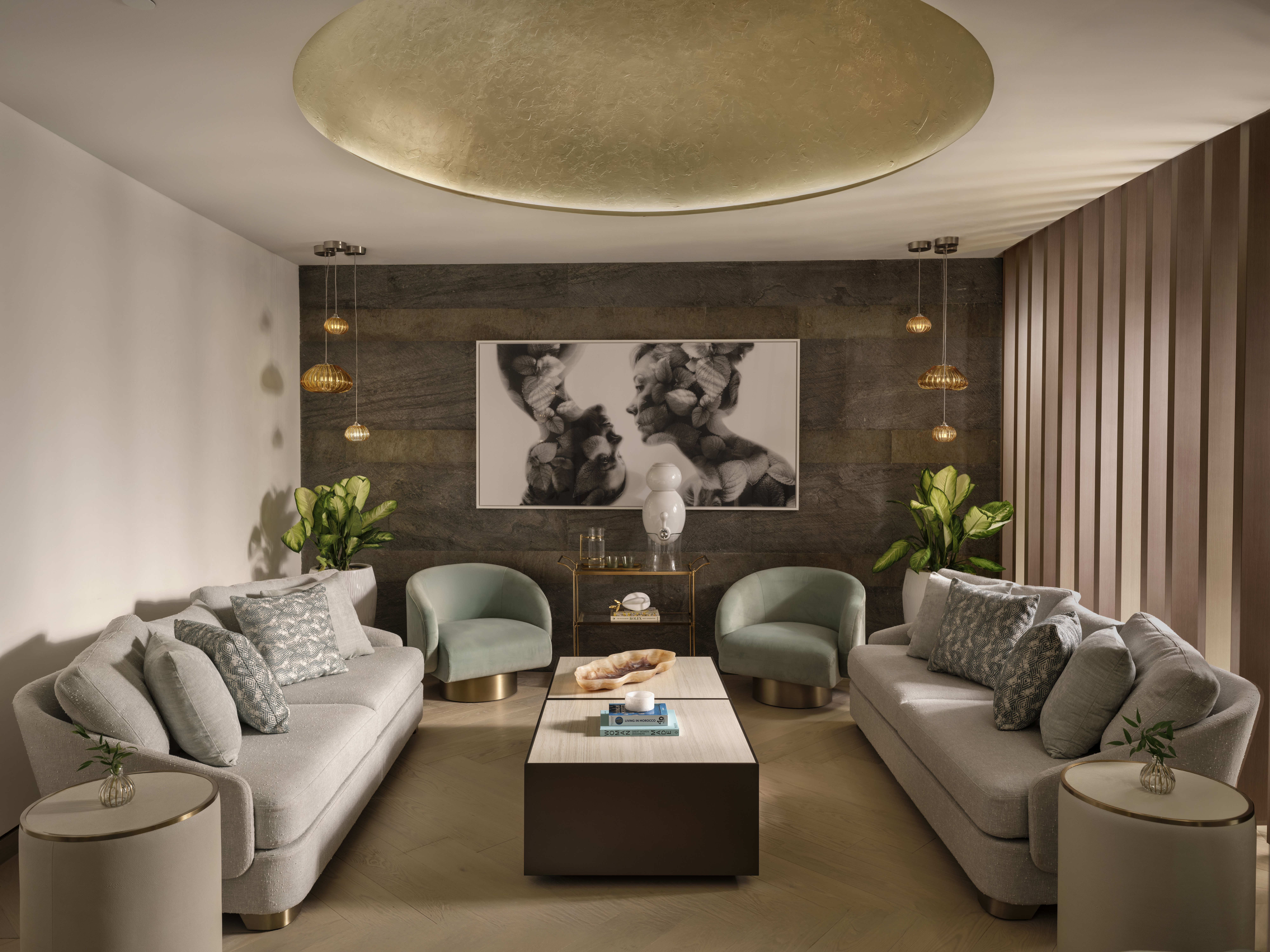 Interior of the Wellness Lounge with sofas and soft lighting at Meraki Wellness in Grand Cayman