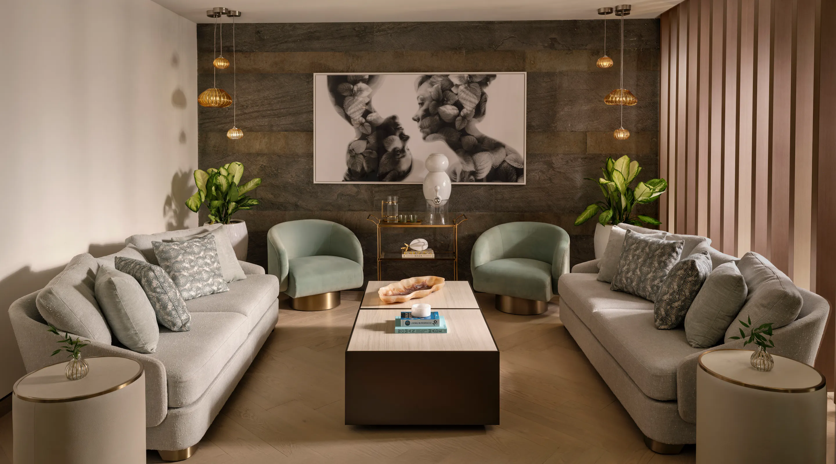 Interior of the Wellness Lounge with sofas and soft lighting at Meraki Wellness in Grand Cayman