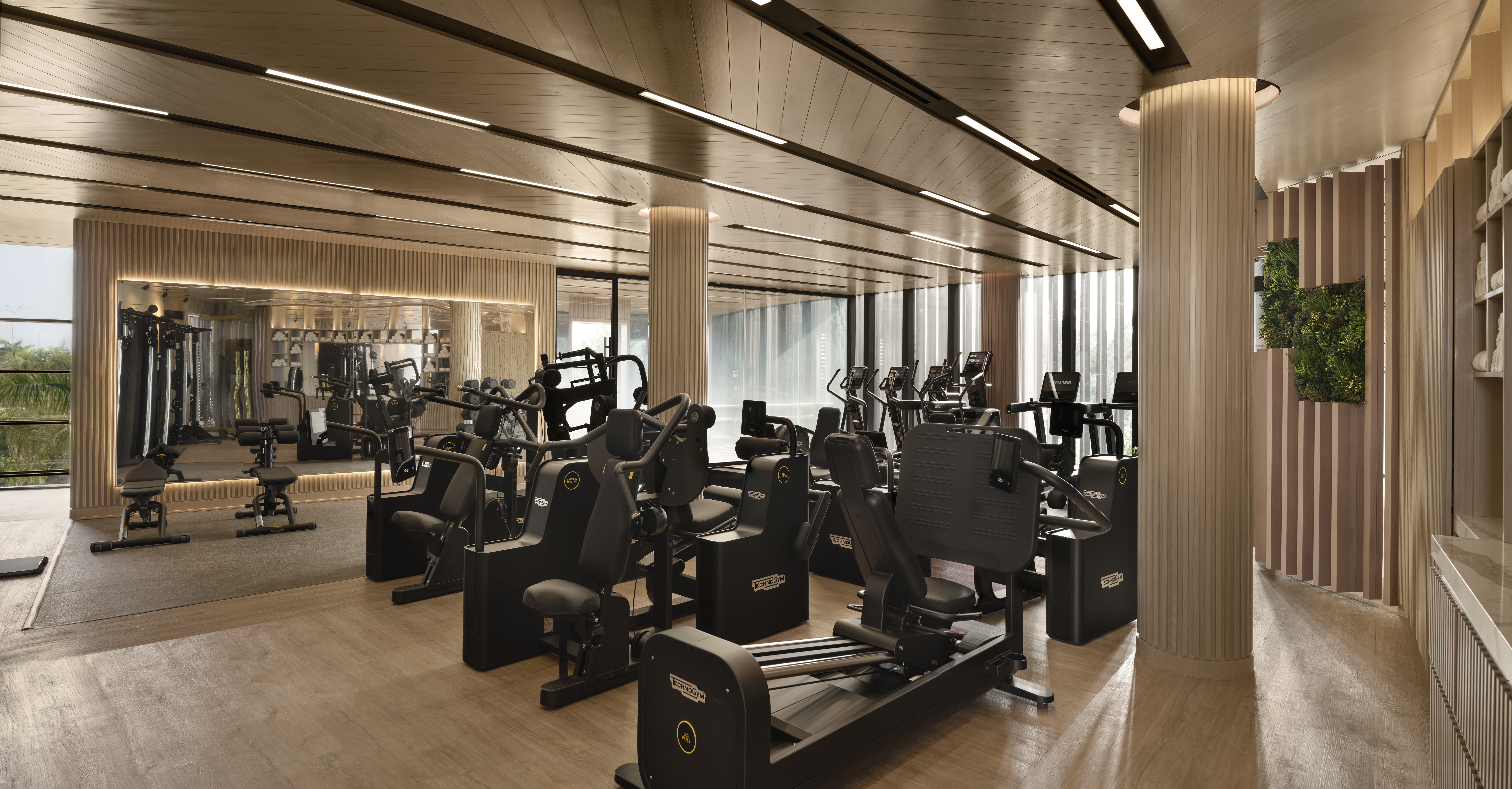 Interior of the Fitness Lounge with strength and cardio equipment at Meraki Wellness