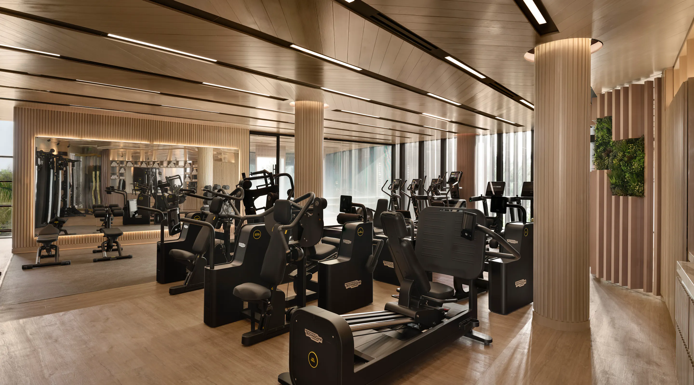 Interior of the Fitness Lounge with strength and cardio equipment at Meraki Wellness