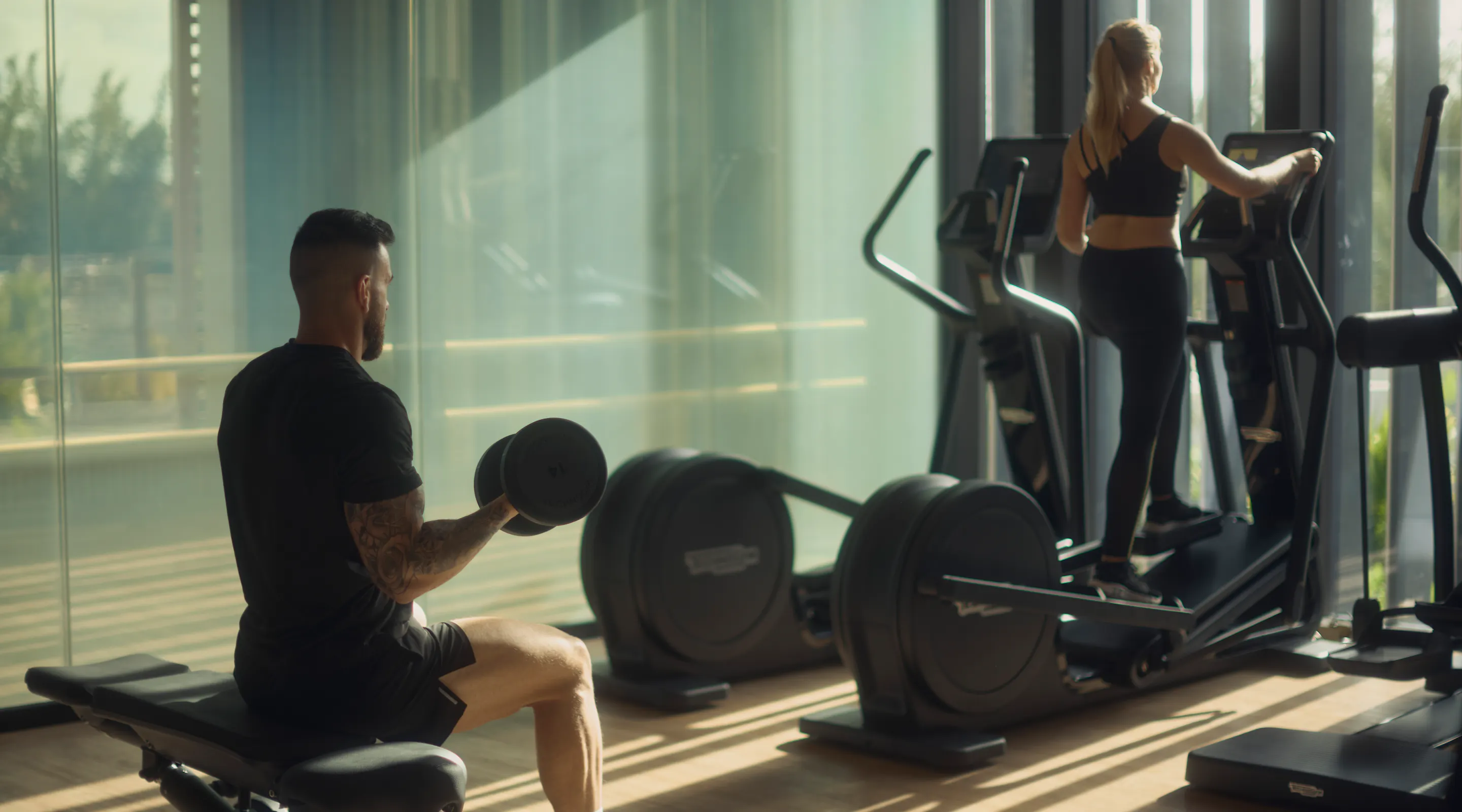 Meraki Wellness team members using Technogym equipment in the Fitness Lounge