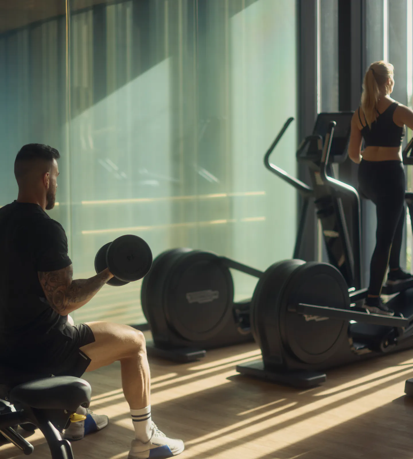 Meraki Wellness team members using Technogym equipment in the Fitness Lounge