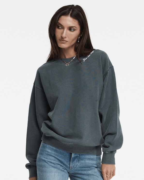 Embroidered washed grey oversized crewneck sweatshirt with cursive neckline script detail, produced by MerchCamp for Logan Hollowell