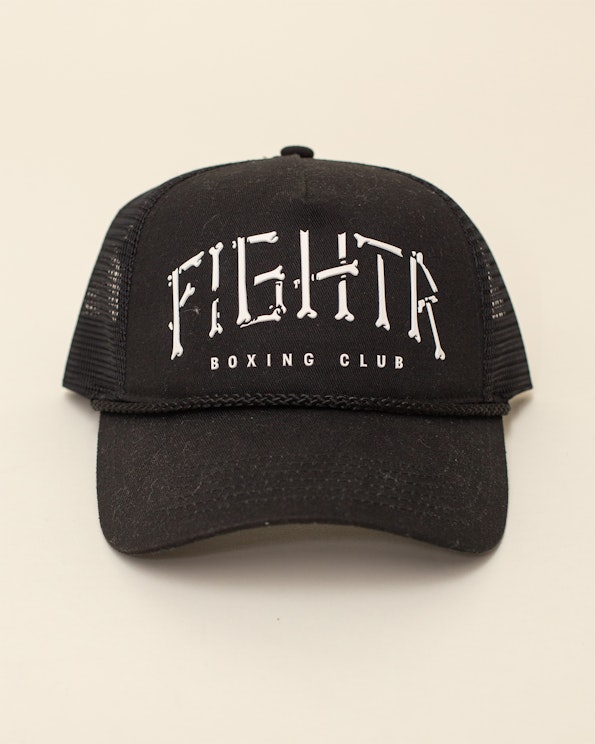 Silicon printed black mesh trucker hat with bone-letter typography and boxing motif, produced by MerchCamp for FIGHTR Boxing Club