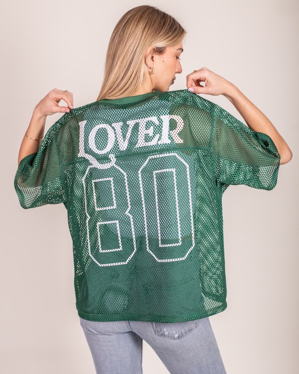 Full custom green mesh football jersey with white "LOVER 80" back print, produced by MerchCamp for Ruben Rojas