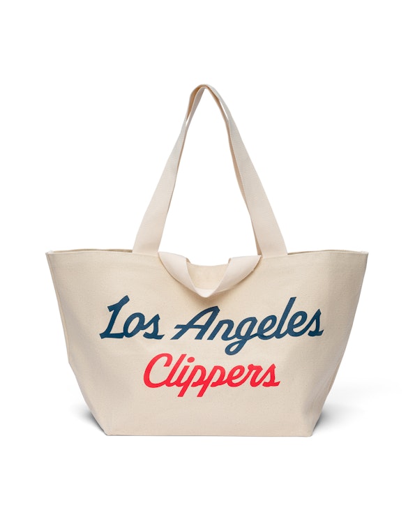 Full custom natural canvas jumbo tote bag with blue and red script lettering, produced by MerchCamp for LA Clippers