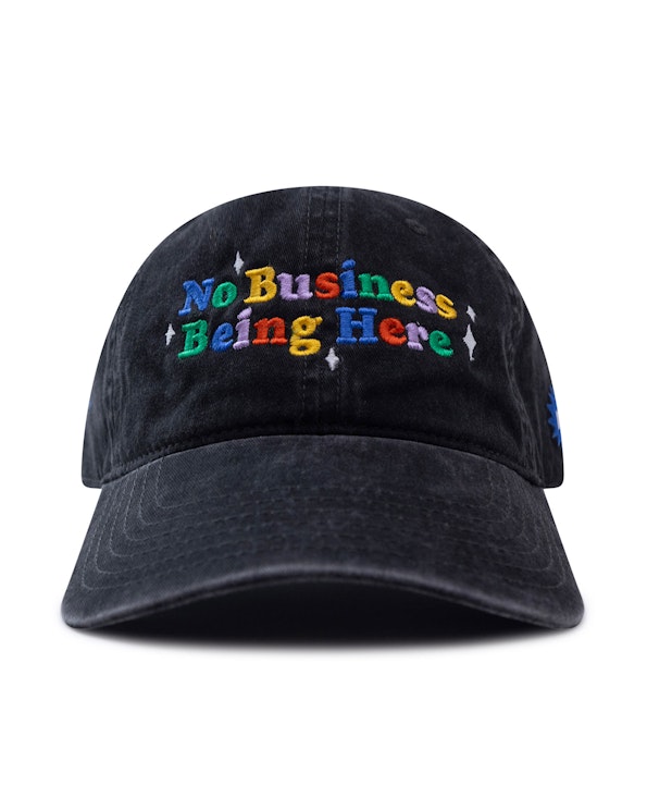 Embroidered washed black cotton dad hat with multicolor rainbow lettering, produced by MerchCamp for Wave Sports + Entertainment