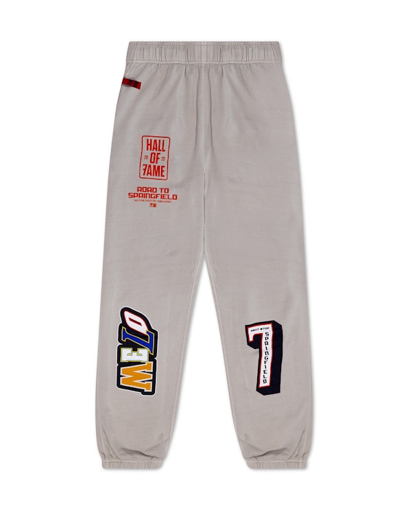Screen printed grey fleece sweatpants with bold Melo graphics and Hall of Fame, produced by MerchCamp for Wave Sports + Entertainment