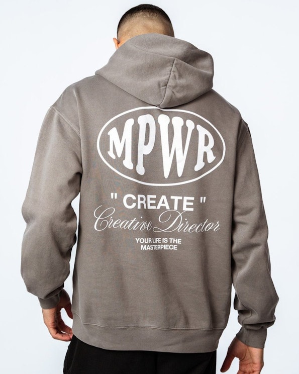 Screen printed grey oversized fleece hoodie with white oval MPWR logo graphic, produced by MerchCamp for MPower6 Gym
