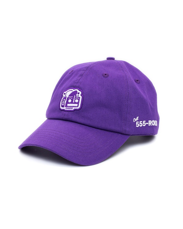 Embroidered purple cotton dad hat with robot logo patch and 555-ROKO text, produced by MerchCamp for Roku