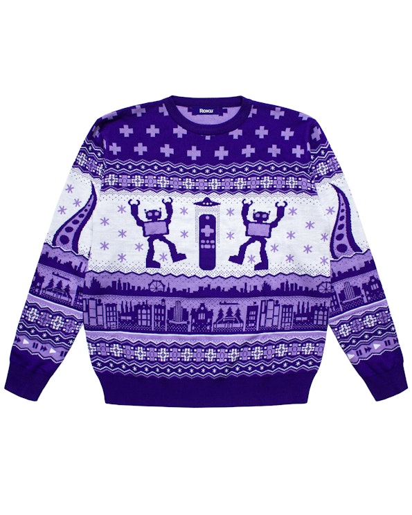 Full custom purple and white knit Christmas sweater with robot, remote, and cityscape motifs, produced by MerchCamp for Roku