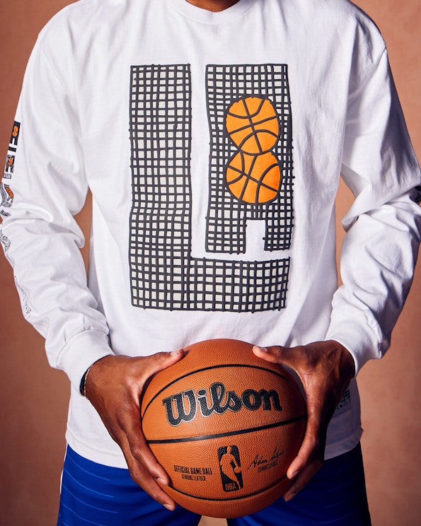 Screen printed white cotton long sleeve tee with LA grid graphic and basketball motifs, produced by MerchCamp for LA Clippers